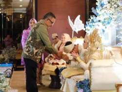 Resepsi Pernikahan Muhammad Furqan Akhyar Putra dan Ghina Murinda Muzni di Hadiri Sekda Kota Batam