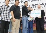 10 Ahli Waris Terima Santunan Rp420 Juta, Amsakar: Bukti Nyata Perlindungan Sosial untuk RT dan RW