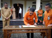 Bupati Karimun Iskandarsyah melakukan Penandatanganan pada apel  Perencanaan Sensus tahun 2026.